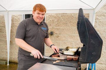 Rory McKeever manning the grill at the Pronto 2021 'Summer' BBQ
